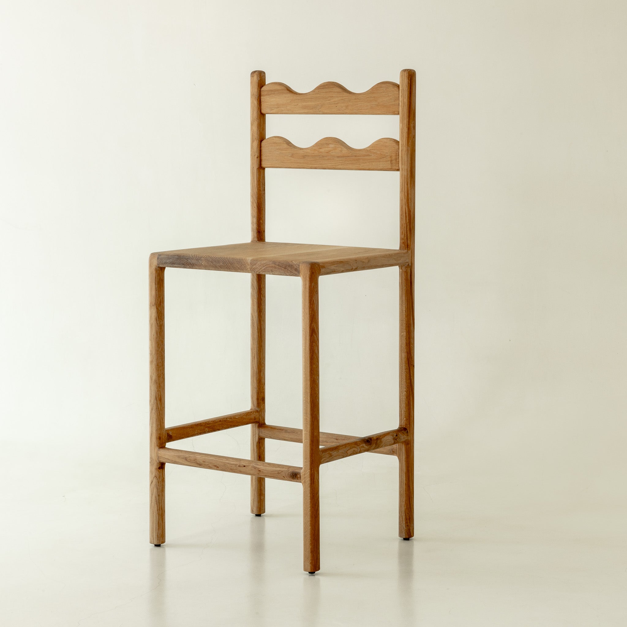 Charlie Solid Oak Counter Stool - front angle in a natural oak