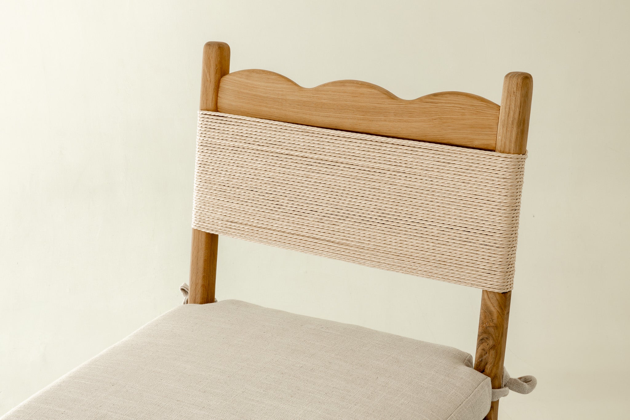 Lilly solid oak dining chair with cushion - close up of the backrest