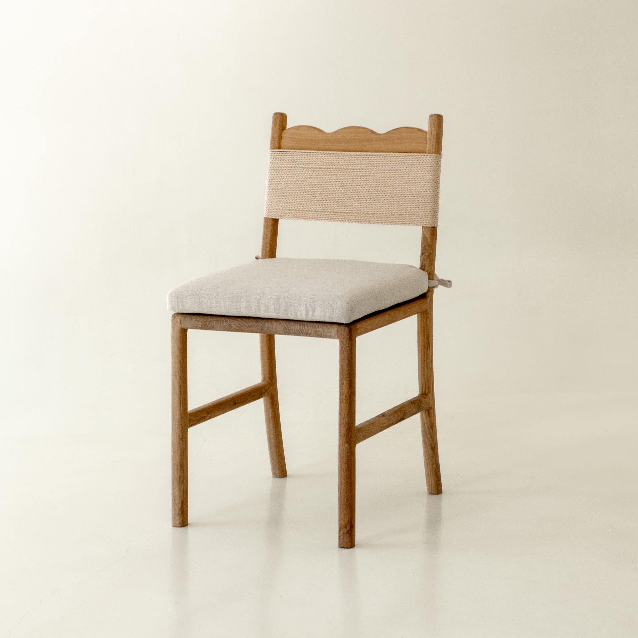 Lilly solid oak dining chair with cushion - front angle 
